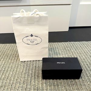 Prada shopping bag (9.75x6.25x3”) with ribbon and box